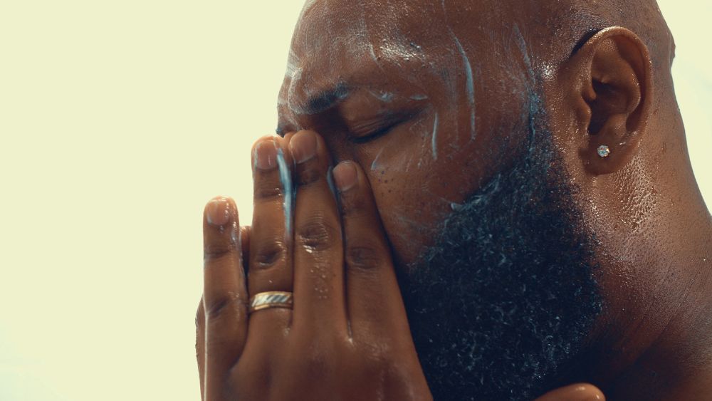 A man washing his face
