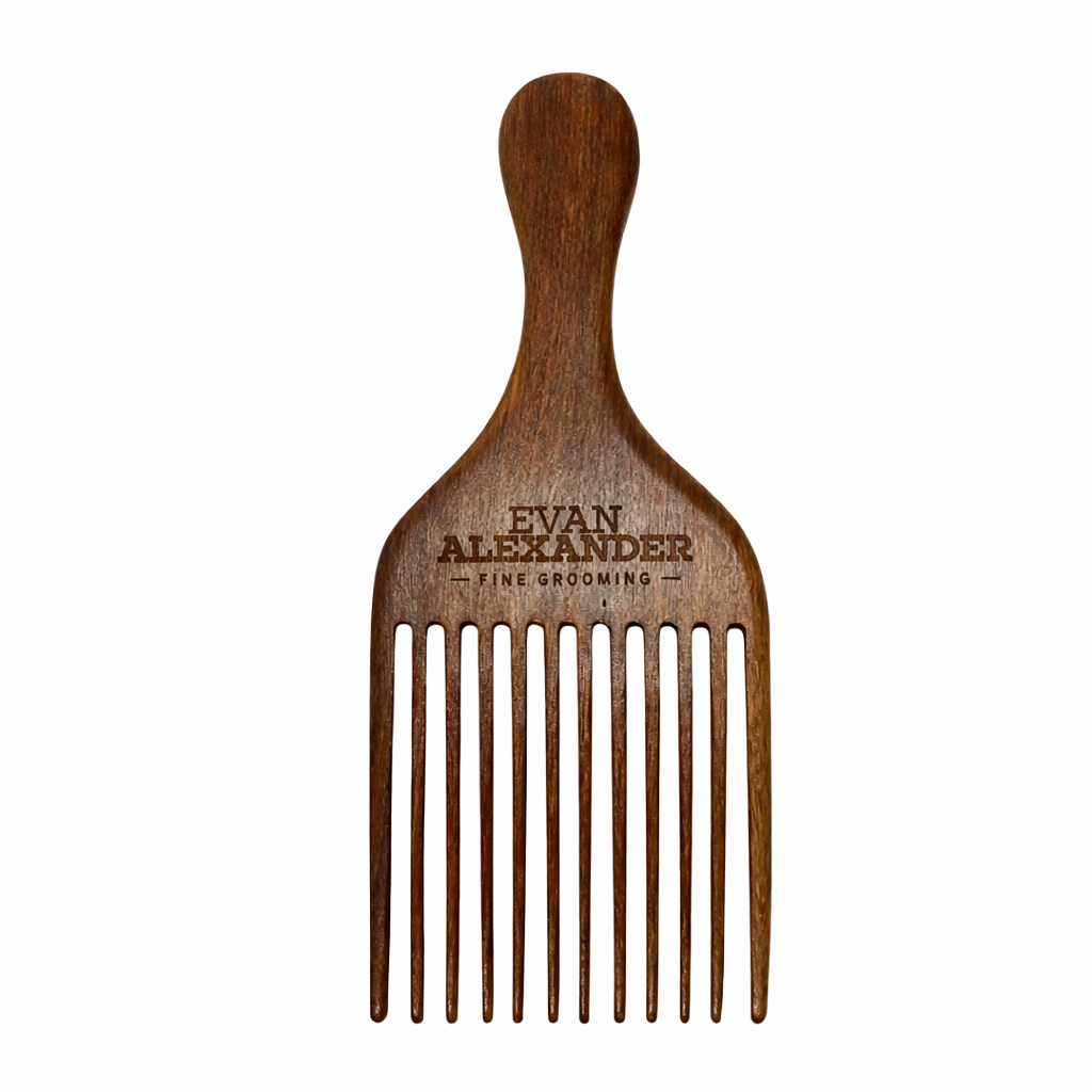 Wooden comb with 'Evan Alexander' branding on a white background