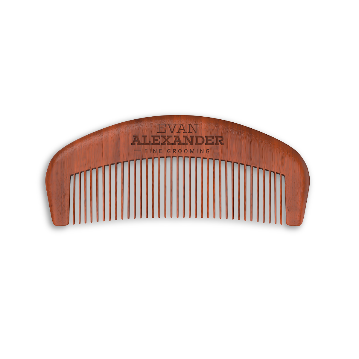 A curved red sandalwood beard comb with fine teeth, and the name 'Evan Alexander' engraved on the top center.