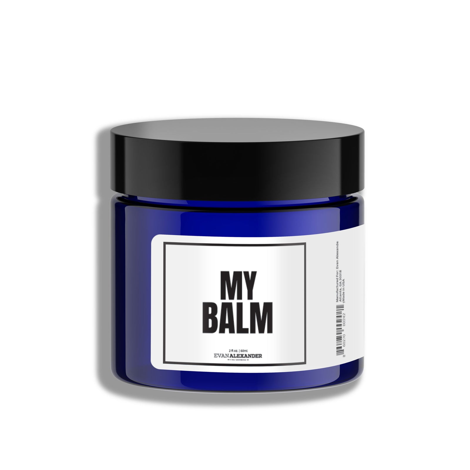 A blue jar with a black lid labeled 'MY BALT' which stands for beard balm, indicating it is a grooming product for beard care.