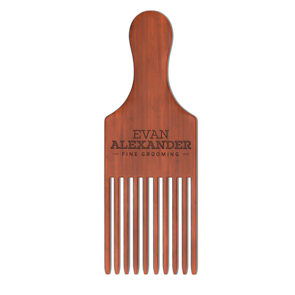 Wooden comb with 'Evan Alexander Fine Grooming' branding on a white background
